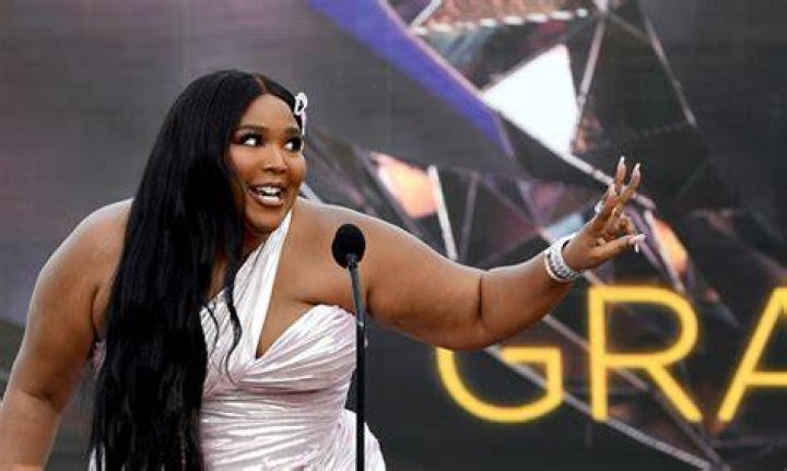 Lizzo Poses In A String Bikini & Declares It's A "BIG GRRRL SUMMER!"